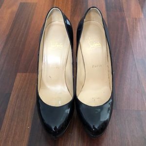 Christian Louboutin black pumps